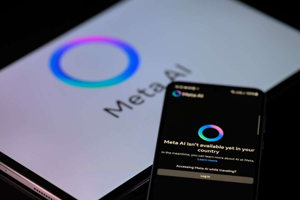 The Meta AI app is displayed on a mobile phone with the Meta AI logo visible on a tablet in this photo illustration