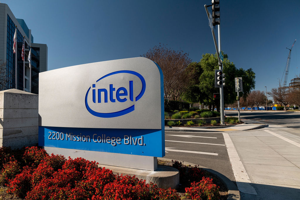 Signage at the entrance to Intel headquarters in Santa Clara, California, U.S., on Wednesday, Jan. 20, 2021. Investors want to know if the world's largest chipmaker will outsource more production when Intel Corp. reports results Thursday. Photographer: David Paul Morris/Bloomberg via Getty Images